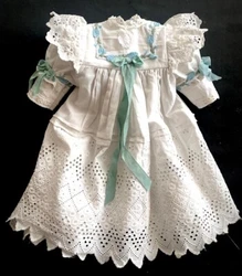 Our dresses and bonnets are made from antique and vintage fabrics and designed based on original antique patterns. They...