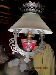 This lamp is gorgeous especially when lit.I believe the lamp is all original including the kerosene fount.