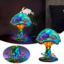 Stained Glass Table Lamp: When the lamp is switched on, light radiates through the glass shade and illuminates the...
