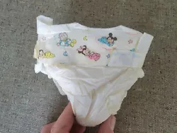 Vintage Pampers Disney Babies Diaper Size Newborn. Was on a doll shows some wear and minor damage hard to find diaper