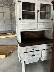 antique possum belly cabinet. All wood no metal on the cabinet. Does need two pull knobs. I purchased it and can not...