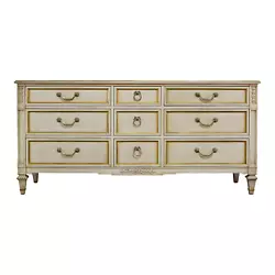 The chest features the original Ivory Rochelle finish with a newly gilt gold accent. This is an antique wash/wax...