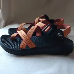 Dark orange with brick red dashes. Black rubber soles.