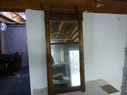 This exquisite antique mirror from 1810 boasts a stunning Federal design with carves acanthus pillars and the original...