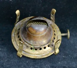 Not polished; not dented. All brass including center “tube”. Holds about 2.5” chimney; Number 1 size fitter.