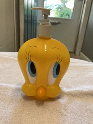 Item is used. The plastic is chipped away underneath the dispenser (see pictures).