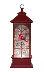 Glitter inside blows around when turned on. Features a stained glass look with cardinal to represent our dearly...