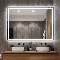 LED Illuminated Dimmable Bathroom Mirror with Bluetooth Speaker. This stylish wall mounted LED mirror has a dimmable...