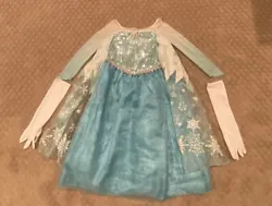 Disney Store Frozen ELSA Costume Dress Size 5/6 with Gloves.PreOwned in great condition no holes or rips from a smoke...