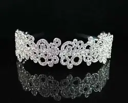 This gorgeous infinity circles Austrian rhinestone tiara/headband. All the rhinestones are twinkling! This...