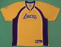 Vintage Authentic Nike Los Angeles Lakers NBA Shooting Jersey in VG Condition. Size M measures 24” pit to pit and...
