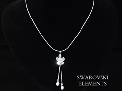 Cristal de swarovski un cadeau qui va ravir vos proches ou se faire. pendentif : 6 cm x 1,5 cm. Magnifique pièce...