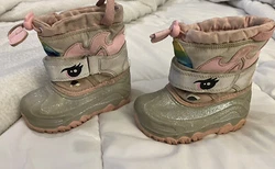 In a beautiful shade of pink with velcro accents, these boots are made of man-made upper material and have a standard...