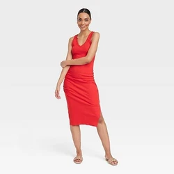 •Model is wearing size 1X in video •Sleeveless ribbed dress with ruched sides •2x2 rib fabric •Soft, stretchy...