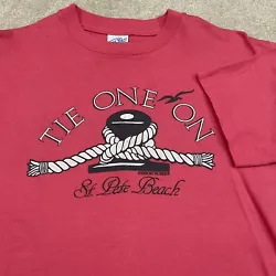 Very good used condition. Graphic is in excellent condition. Front of shirt has pin size hole and back of shirt has a...