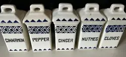 This is a group of five antique spice containers made in Germany by Staffel. They are white with blue designs and...
