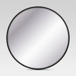 •Round wall mirror adds depth and dimension to your decor •Sleek metal frame and rounded silhouette bring...