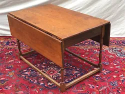 18TH CENTURY WILLIAM & MARY PERIOD ANTIQUE DROP LEAF TAVERN TABLE. It is in its original finish and otherwise...