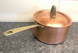 Preowned in good useable condition. Sits flat. Nice and heavy. Paul Revere insignia on bottom.