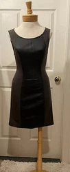 No rips or stainsBlack faux leather and greyZipper closure in backVery comfortable Pet free smoke free home 32”...