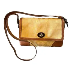 Authentic Coach Bag. -Canvas Signature gold/yellow canvas with trim in soft tan leather.