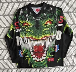 Elevate your activewear game with this 100% authentic Supreme Dragon Hockey Jersey. The multicolor fabric wash and...