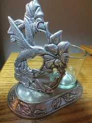 INCLUDES THE GLASS VOTIVE CUP.
