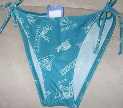 Body: 82% nylon, 18% spandex. Lining: 100% polyester. Lined front. Color: Multi-color.