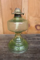 For sale is this antique glass depression oil lamp.