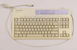 Olympus Exera MAJ-845 keyboard. For the Olympus CV-160. Item location: Storage Room Shelf B. All keys tested working.