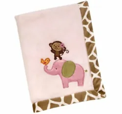 Pink blanket with monkey, elephant and bird appliques. Allover giraffe print binding around the blanket. The reverse...
