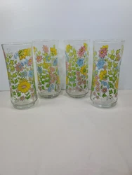 This set of four large round drinking glasses from the beloved vintage Corning Spring Meadow collection is sure to...