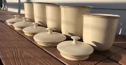 Set of 10 Kitchen Storage Canisters w/lids. Beige air tight. Used but in great condition. Ships USPS Parcel Select...