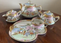 Up for your consideration a magnificent Japanese Kutani porcelain Tea Set -16 pieces plus 3 free snack trays. 5 Snack...