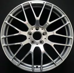 There are no scratches, dents, dings, or other blemishes. This is an OEM wheel with an original stamp AND part number....