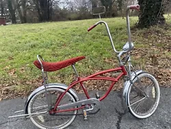 Vintage Lowrider Bike. Shows wear from age and use.20”, red cloth banana seat.***This bike has been relisted because...