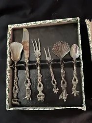 There are 6 beautiful unique pieces in this serving set with original box.