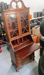 Antique Maddox Red Mahogany Claw Foot Secretary Hutch and Desk With Keys. There is a few scratches and the cupboard’s...