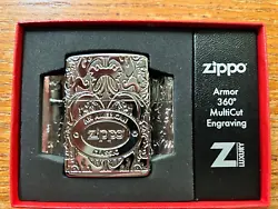 A RARE ZIPPO LIGHTER. This lighter is heavy, looks fantastic, and overall impressive. Lighter Specs.