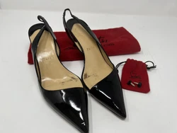 CHRISTIAN LOUBOUTIN Kate Asymmetric Slingback heel 65mm or 2.5inch Black, patent leatherThis is a GREAT shoe on. I’m...