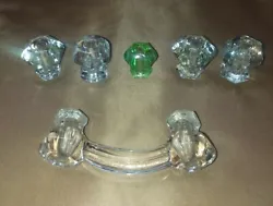 My father was a scrapper and salvaged all kinds of things. The four clear glass single pieces are identical to each...