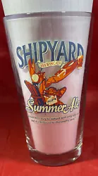 The glass is adorned with a colorful illustration of a lobster relaxing in a chair, giving off coastal vibes. It is...
