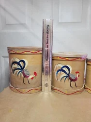 The canisters are adorned with a charming rooster design, adding a rustic feel to your kitchen decor.
