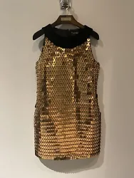 Antique Gold Sequined Dress. Hook and eye closure at neck. Low plunging back. SIMPLY FABULOUS.