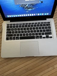 The top cover is scratched around the edges. There is a small nick on the top of edge of the screen. Computer works...