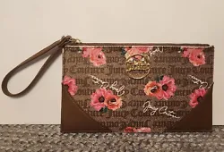 Juicy Couture Floral Design Wristlet Pouch NWOT  Size S/M  Height is approximately 6”  Length is approximately 10” ...