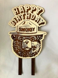 This listing is for one wood Smokey the Bear Happy Birthday cake topper. It was used once, very clean. The Smokey Bear...