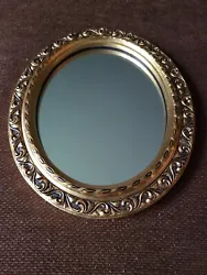 Custom Framed Oval Ornate Gold Wall Mirror. Exterior dimensions are approximately 12.5 inches high x 10.5 inches wide x...