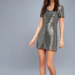 Mini dress, above-knee length. 95% Polyester, 5% Spandex. Total length (shoulder to hem)- 31.5”. 100% Polyester...