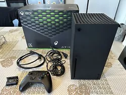 Microsoft Xbox Series X 1 To Console - Noir. Très peu servi comme neuve vendu avec la batterie pour la manette